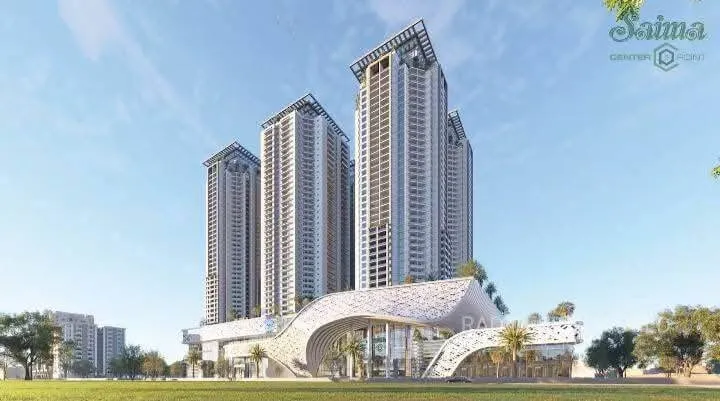Three modern high-rise towers and futuristic curved entrance at Saima Center Point in Karachi, with palm trees and landscaped