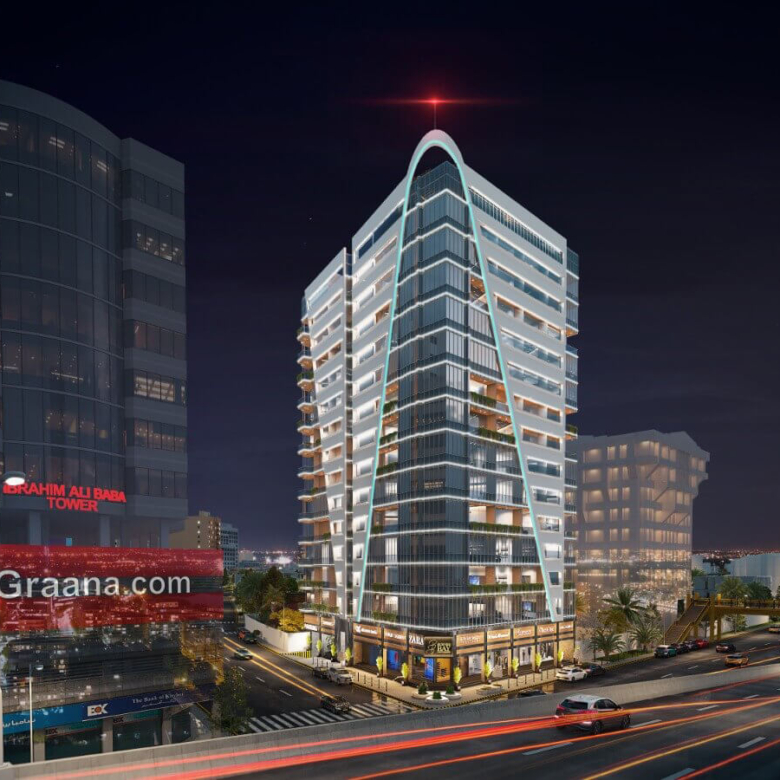 Business Bay office tower on Shahra-e-Faisal, Karachi, modern curved glass high-rise at night with urban lights and traffic