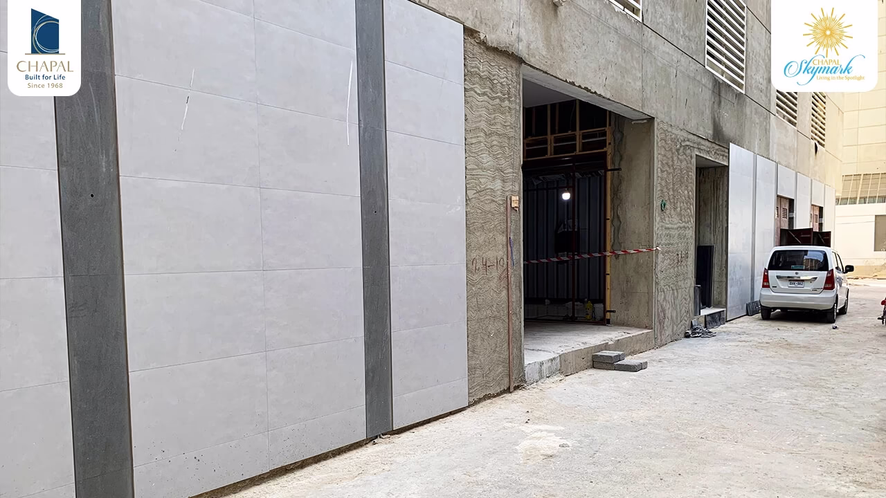 Chapal Skymark 50-storey tower construction site with concrete walls, panels, and open entrance framing
